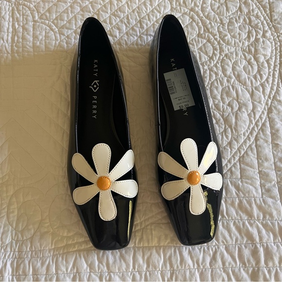 Katy Perry Collections Shoes - Katy Perry Collections Black Patent Flats with White Daisy Accent